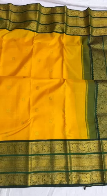 Yellow with Bottle Green Korvai Kanjeevaram Silk Saree