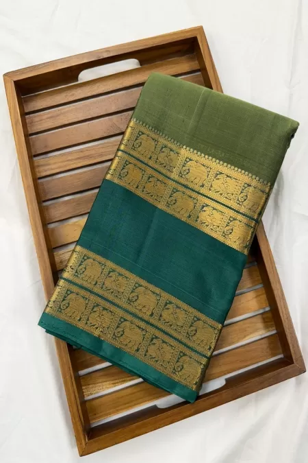 Gap Border Mehendi Green with German Blue Kanjeevaram Silk Saree
